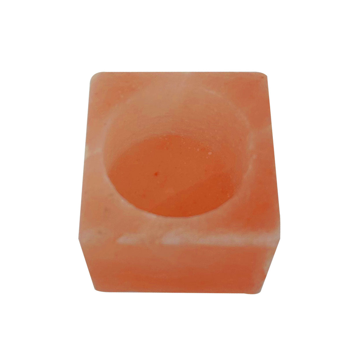 Square block of pink soap on a white background