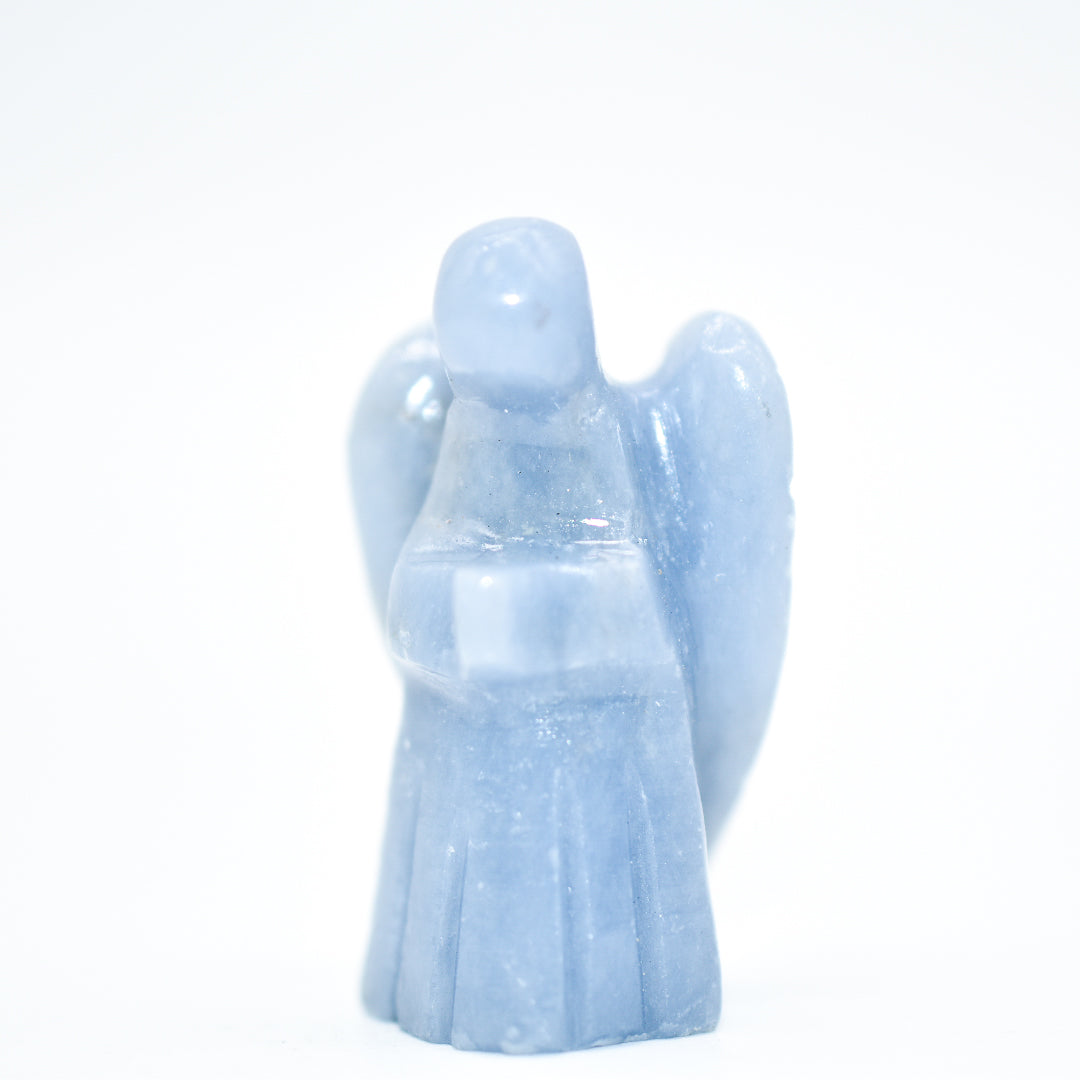 Blue angel figurine on a white background
