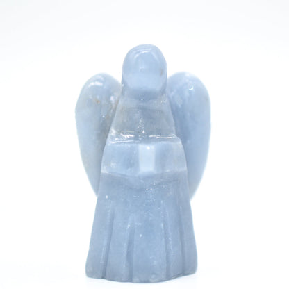 Crystal angel figurine on a white background