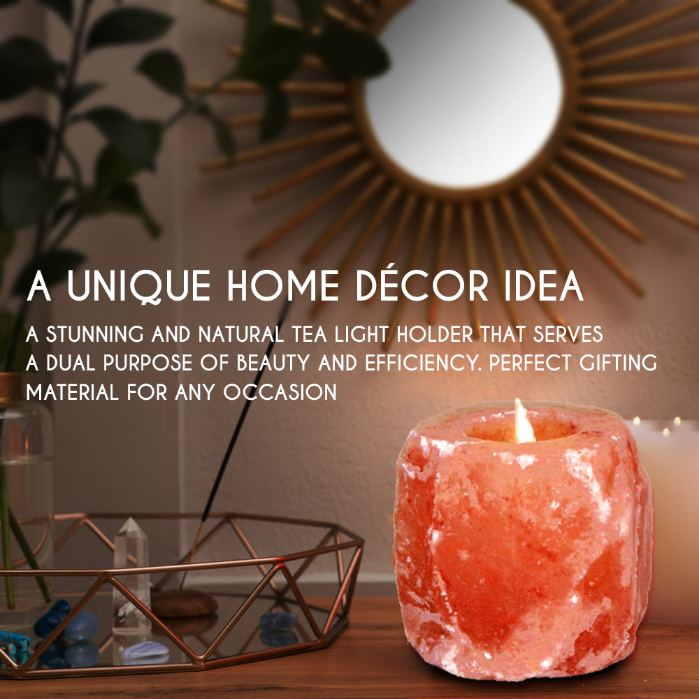 Himalayan salt lamp on a wooden surface with decorative elements in the background