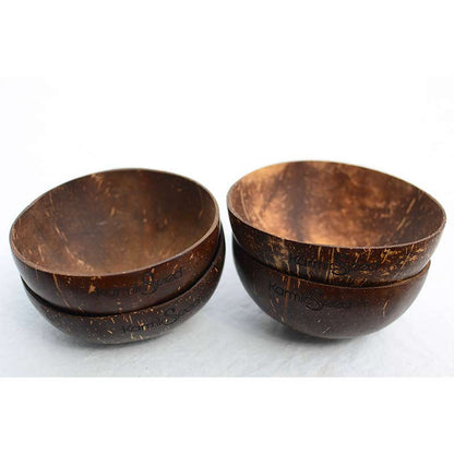 Two coconut bowls stacked on a white background