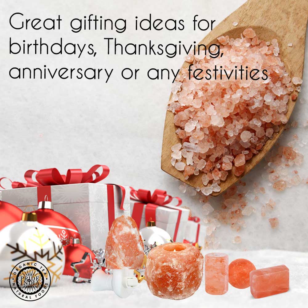 Himalayan salt products with gift boxes and festive decorations on a light background