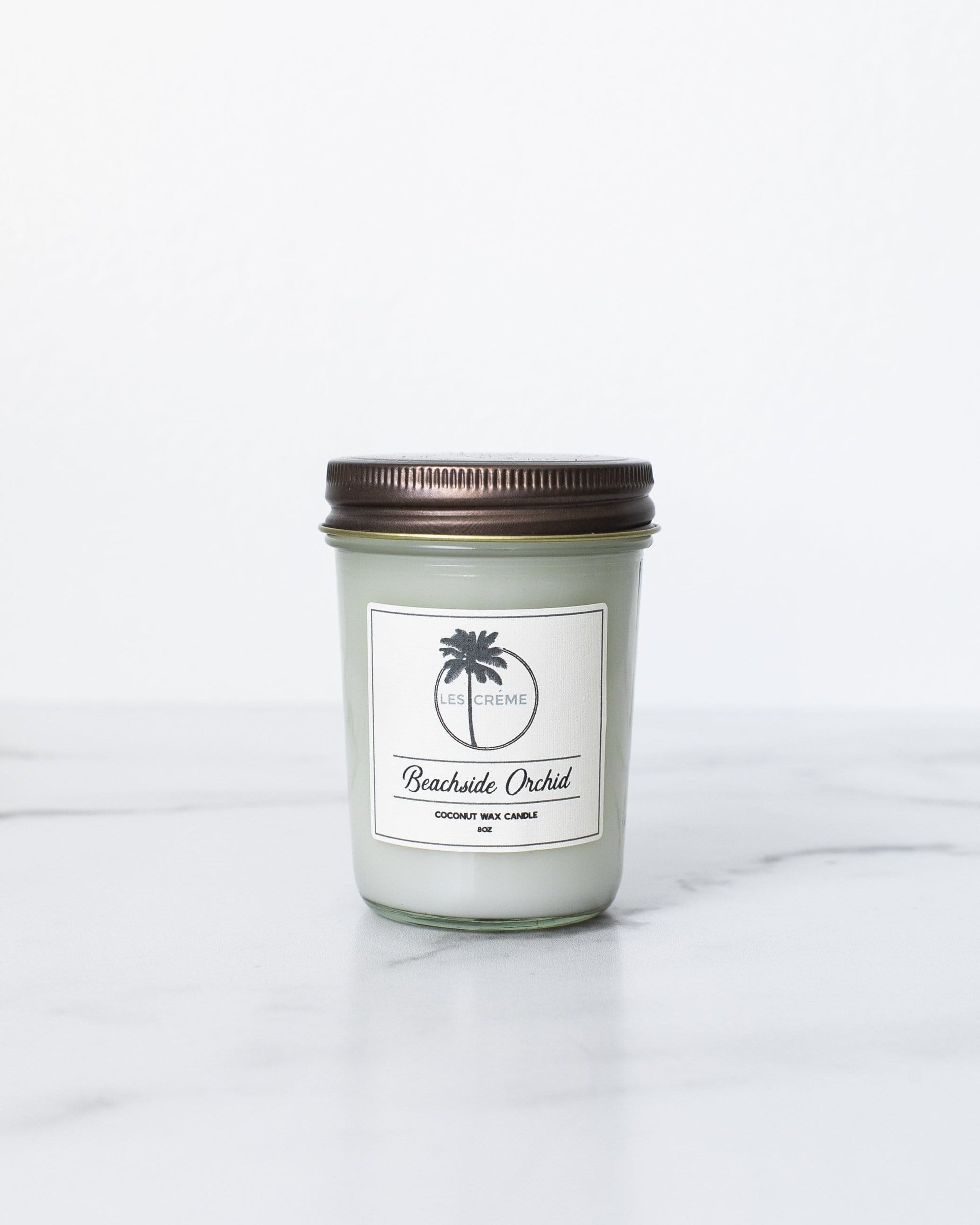 Candle with a label on a white background