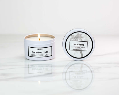 Candle with 'Les Crème' branding on a white background
