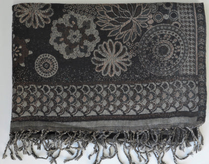 Black and gray patterned scarf with fringes on a white background