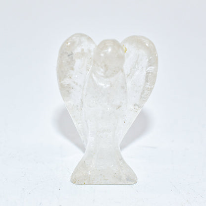 White ceramic angel figurine on a white background