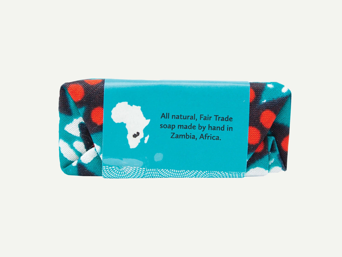 Bar of soap with a blue label featuring an African map, on a white background