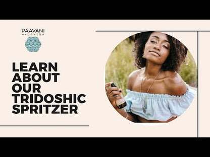Promotional image for Paavani Ayurveda's tridoshic spritzer with a woman holding a phone.