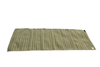 Folded green mat with white stripes on a white background