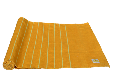 Yellow towel with white stripes on a white background
