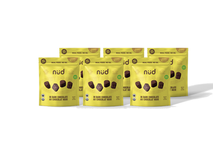 Multiple packages of Nud chocolate bars on a white background